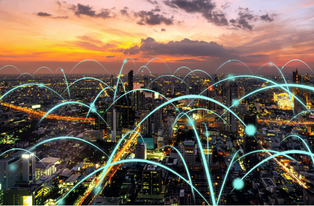Digital Transformation of Trade - city at sunset connected by virtual lines
