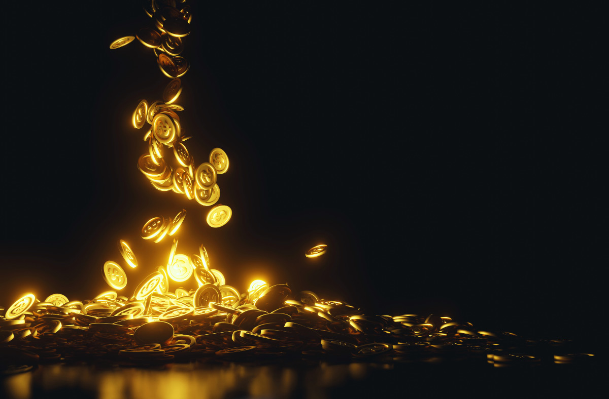 coins dropping into a pile symbolizing cash flow
